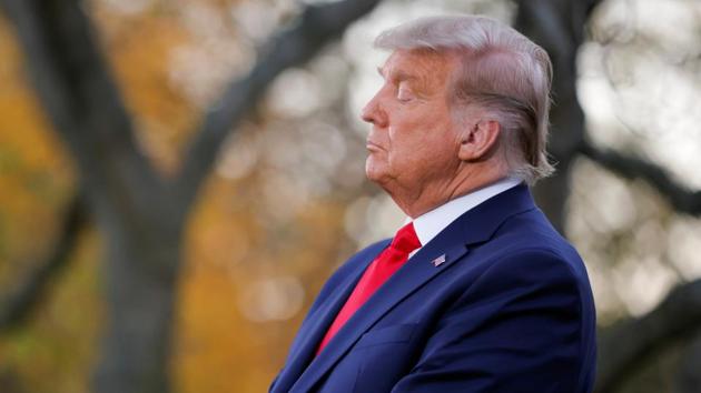US President Donald Trump listens to Vice President Mike Pence speak during an event about the "Operation Warp Speed" program in the Rose Garden of the White House in Washington, US (REUTERS) US President Donald Trump listens to Vice President Mike Pence speak during an event about the "Operation Warp Speed" program in the Rose Garden of the White House in Washington, US (REUTERS)