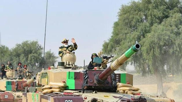 Prime Minister Narendra Modi rides in an Army tank at Longewala in Jaisalmer, Saturday.(PTI) Prime Minister Narendra Modi rides in an Army tank at Longewala in Jaisalmer, Saturday.(PTI)