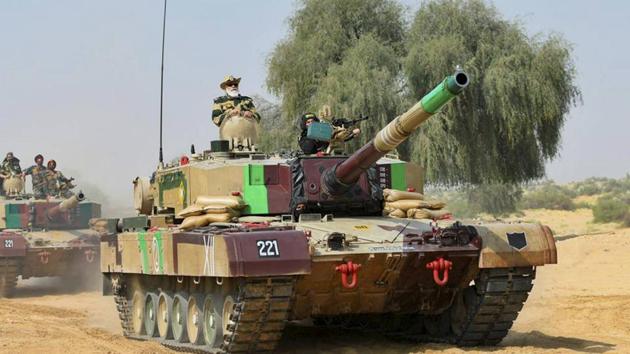 JPrime Minister Narendra Modi rides a tank during his visit to strategic Longewala post in Jaisalmer, Saturday, 14, 2020.(PTI photo) JPrime Minister Narendra Modi rides a tank during his visit to strategic Longewala post in Jaisalmer, Saturday, 14, 2020.(PTI photo)