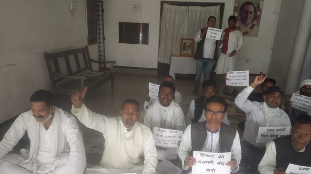 A group of Congress leaders staged a sit-in on Sunday at the Sadaqat Ashram, the state headquarters of the Congress party in Patna, demanding a complete revamp of the Bihar unit of the party.(HT PHOTO)