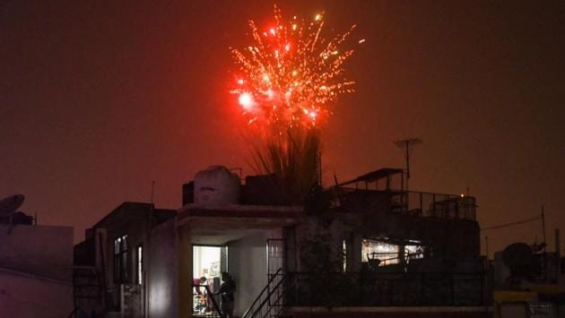 Fireworks set off in Safdarjung Enclave during Diwali celebrations in New Delhi on November 14. The pandemic also upended some of the celebrations in India, particularly in New Delhi, which has seen a renewed spike in coronavirus infections in recent weeks. Some people defiantly set off traditional firecrackers in Delhi despite a ban imposed because of sky-high pollution levels. (Amal KS / HT Photo) Fireworks set off in Safdarjung Enclave during Diwali celebrations in New Delhi on November 14. The pandemic also upended some of the celebrations in India, particularly in New Delhi, which has seen a renewed spike in coronavirus infections in recent weeks. Some people defiantly set off traditional firecrackers in Delhi despite a ban imposed because of sky-high pollution levels. (Amal KS / HT Photo)
