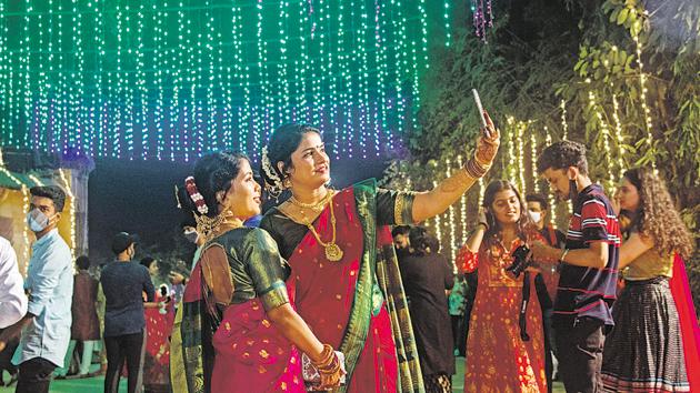 Mumbai, India - Nov. 14, 2020: People click picture with colourful lighting on the occasion of Diwali festival at Shivaji park,Dadar in Mumbai, India, on Saturday, November 14, 2020.(Pratik Chorge/HT Photo)