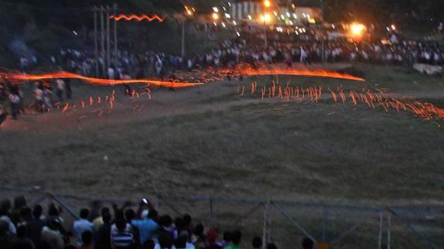 Hingot is an age old tradition in the Gautampura village, about 55 kilometre north west of Indore city, when two communities attack each other with fireballs.(HT Photo) Hingot is an age old tradition in the Gautampura village, about 55 kilometre north west of Indore city, when two communities attack each other with fireballs.(HT Photo)