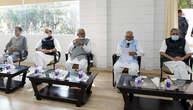 Bihar chief minister-elect Nitish Kumar with defence minister Rajnath Singh during NDA Legislature party meeting, in Patna on Sunday (ANI Photo)