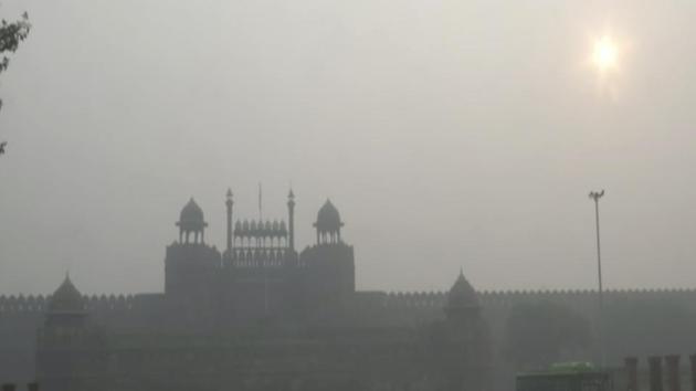 A hazy view of Red fort with reduced visibility as air quality deteriorates in Delhi.(ANI)