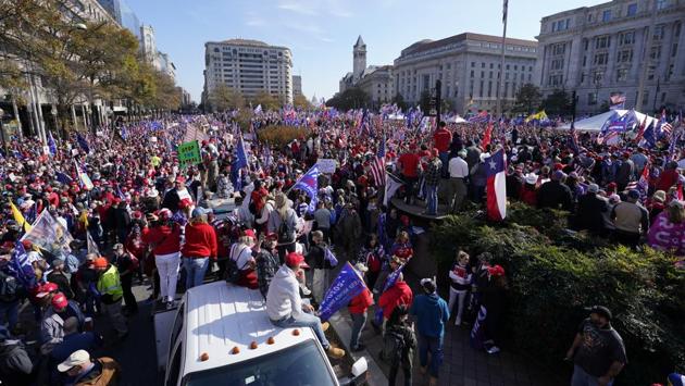 Supporters of President Donald Trump rally at Freedom Plaza on November 14 in Washington, D.C. Several cities saw gatherings of Trump supporters unwilling to accept Joe Biden’s Electoral College and popular vote victory as legitimate. The demonstrations in the nation’s capital went from tense to violent during the night and early November 15. (Julio Cortez / AP) Supporters of President Donald Trump rally at Freedom Plaza on November 14 in Washington, D.C. Several cities saw gatherings of Trump supporters unwilling to accept Joe Biden’s Electoral College and popular vote victory as legitimate. The demonstrations in the nation’s capital went from tense to violent during the night and early November 15. (Julio Cortez / AP)