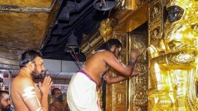 Priests perform rituals for the 'Tulamas Puja' at the Sabarimala temple, in Pathanamthitta district.(PTI)