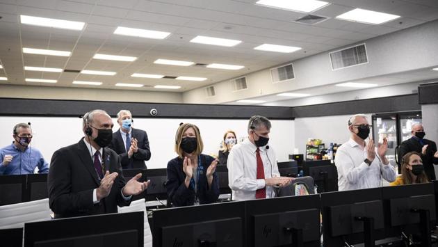 NASA and SpaceX managers applaud after the launch of a SpaceX Falcon 9 rocket carrying the Crew Dragon spacecraft, at Firing Room 4 of the Launch Control centre at NASA’s Kennedy Space Center in Cape Canaveral, Florida on November 15. NASA is calling the flight its first “operational” mission for a rocket and crew-vehicle system that was 10 years in the making.