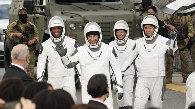 NASA astronauts, from left, mission pilot Victor Glover, Michael Hopkins, physicist Shannon Walker and Japan Aerospace Exploration Agency astronaut Soichi Noguchi leave the Operations and Checkout building on their way to launch pad 39A at the Kennedy Space Center in Cape Canaveral, Florida on November 15. This is Noguchi’s third trip to space after previously flying on the US shuttle in 2005 and Soyuz in 2009, Reuters reported. (John Raoux / AP)