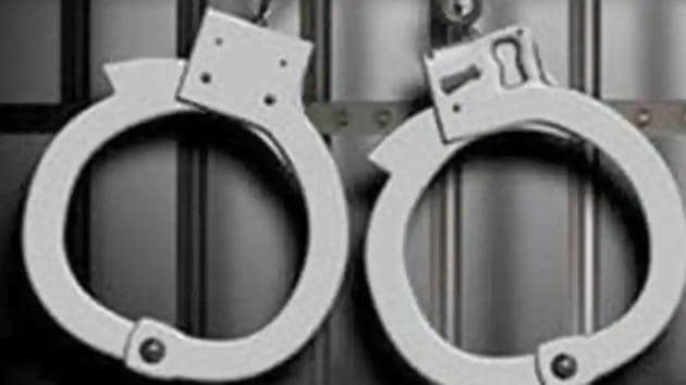 AEC officers recovered two pistols and seven live cartridges from the accused.(HT Photo) AEC officers recovered two pistols and seven live cartridges from the accused.(HT Photo)