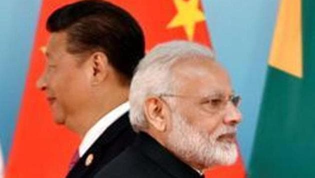 Chinese President Xi Jinping and (right) Indian Prime Minister Narendra Modi. (REUTERS File) Chinese President Xi Jinping and (right) Indian Prime Minister Narendra Modi. (REUTERS File)