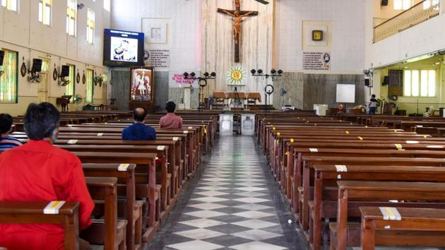 Devotees pray at church in Mumbai while sitting distantly after places of worship reopened in Maharashtra on November 16. More good news on the vaccine front as US-based biotechnology firm Moderna Inc on November 16 said its vaccine candidate has been found to be 94.5 per cent effective in preventing Covid-19. The announcement was based on phase 3 trials, HT reported. (Sujit Jaiswal / AFP) Devotees pray at church in Mumbai while sitting distantly after places of worship reopened in Maharashtra on November 16. More good news on the vaccine front as US-based biotechnology firm Moderna Inc on November 16 said its vaccine candidate has been found to be 94.5 per cent effective in preventing Covid-19. The announcement was based on phase 3 trials, HT reported. (Sujit Jaiswal / AFP)