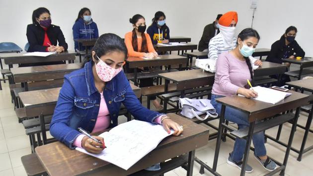 Students back to attending classes at Khalsa College after the state government allowed reopening of colleges and universities following the lockdown due to coronavirus outbreak, in Amritsar on November 16. The trend of daily Covid-19 recoveries outpacing the daily infections continued for the 44th day on November 16 when the country recorded 43,851 recoveries. (Sameer Sehgal / HT Photo) Students back to attending classes at Khalsa College after the state government allowed reopening of colleges and universities following the lockdown due to coronavirus outbreak, in Amritsar on November 16. The trend of daily Covid-19 recoveries outpacing the daily infections continued for the 44th day on November 16 when the country recorded 43,851 recoveries. (Sameer Sehgal / HT Photo)