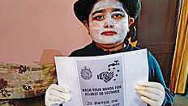 A student taking part in a role-playing activity during online Children’s Day celebrations. A student taking part in a role-playing activity during online Children’s Day celebrations.