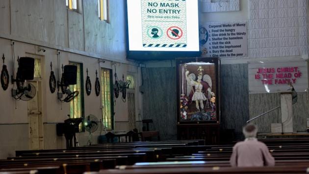 A man prays while a large screen displays Covid-19 precautions inside Mahim Church in Mumbai on November 17. In absolute terms however, Maharashtra continues to be the worst hit state from Covid-19 in India. There are 84,386 active cases in the state from a total of 17,52,509 as on November 17 while 16,18,380 patients have recovered so far. The death toll in the state is at 46,034. (Satish Bate / HT Photo) A man prays while a large screen displays Covid-19 precautions inside Mahim Church in Mumbai on November 17. In absolute terms however, Maharashtra continues to be the worst hit state from Covid-19 in India. There are 84,386 active cases in the state from a total of 17,52,509 as on November 17 while 16,18,380 patients have recovered so far. The death toll in the state is at 46,034. (Satish Bate / HT Photo)