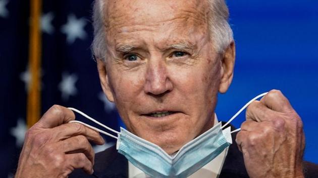 US President-elect Joe Biden removes his face mask to speak about the US economy after attending a briefing in Wilmington, Delaware, US on November 16, 2020.(Reuters File Photo) US President-elect Joe Biden removes his face mask to speak about the US economy after attending a briefing in Wilmington, Delaware, US on November 16, 2020.(Reuters File Photo)