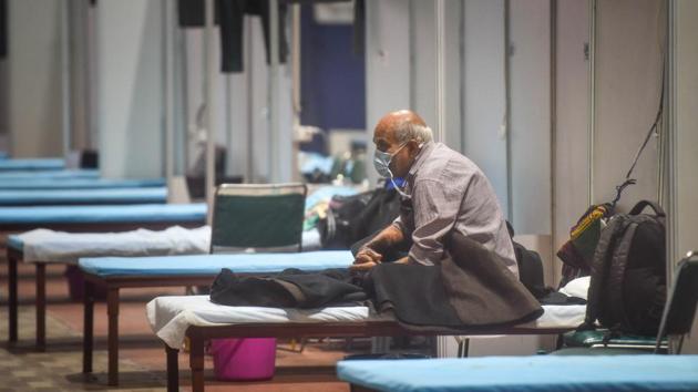 An elderly patient seen at the Commonwealth Games Village (CWG) Covid-19 Care Centre in New Delhi on November 17. As of November 17 data, Delhi had just over 495,000 cases of Covid-19 and is dealing with 42,004 active cases. There have been 7,812 deaths in the national capital attributed to Covid-19. (Sanchit Khanna / HT Photo) An elderly patient seen at the Commonwealth Games Village (CWG) Covid-19 Care Centre in New Delhi on November 17. As of November 17 data, Delhi had just over 495,000 cases of Covid-19 and is dealing with 42,004 active cases. There have been 7,812 deaths in the national capital attributed to Covid-19. (Sanchit Khanna / HT Photo)