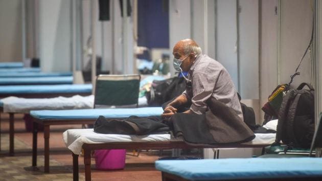 An elderly patient seen inside the Commonwealth Games (CWG) Village Covid-19 Care Centre in New Delhi. (Sanchit Khanna/HT PHOTO) An elderly patient seen inside the Commonwealth Games (CWG) Village Covid-19 Care Centre in New Delhi. (Sanchit Khanna/HT PHOTO)