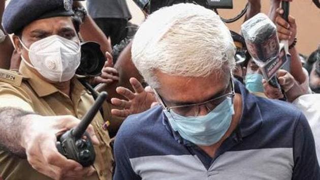 Suspended IAS officer M Sivasankar being taken into custody by Enforcement Directorate (ED) for questioning in connection to the Kerala gold smuggling case, in Kochi.(PTI) Suspended IAS officer M Sivasankar being taken into custody by Enforcement Directorate (ED) for questioning in connection to the Kerala gold smuggling case, in Kochi.(PTI)