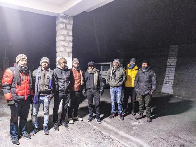 The five engineers after they were rescued from Sarchu and brought to Keylong, the district headquarters of the tribal Lahaul-Spiti district on Thursday.(HT Photo)