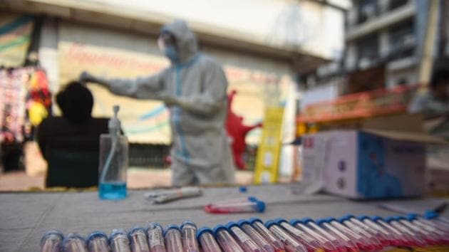 Samples taken for coronavirus testing are laid out on a table during screening, Lajpat Nagar, New Delhi, India, November 18, 2020(Sanchit Khanna/HT PHOTO)