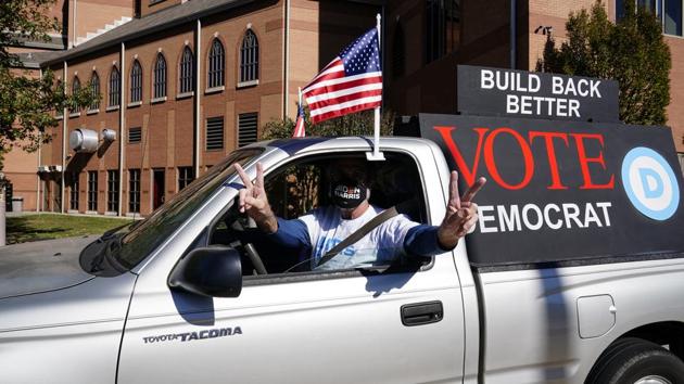 A Democrat supporter. US President-elect Joe Biden is a Democrat (AP Photo/Brynn Anderson) A Democrat supporter. US President-elect Joe Biden is a Democrat (AP Photo/Brynn Anderson)