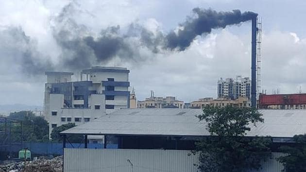 Mumbai residents complained that the black smoke emitted by the waste incineration plant was polluting the area & affecting health of locals.(HT Photo)
