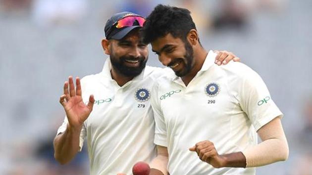 Mohammed Shami and Jasprit Bumrah of India chat during day four of the Third Test match in the series between Australia and India at Melbourne Cricket Ground on December 29, 2018 in Melbourne, Australia.(Getty Images)