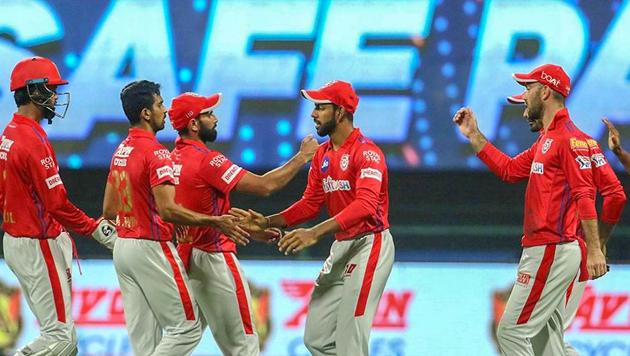 Kings XI Punjab players celebrates the wicket of Robin Uthappa of Rajasthan Royals during the Indian Premier League (IPL) cricket match at the Sheikh Zayed Stadium, in Abu Dhabi.(PTI)
