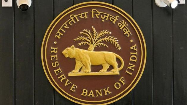 CCTV cameras are seen installed above the logo of Reserve Bank of India (RBI) inside its headquarters in Mumbai.(REUTERS) CCTV cameras are seen installed above the logo of Reserve Bank of India (RBI) inside its headquarters in Mumbai.(REUTERS)