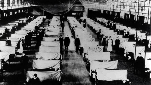 A warehouse converted to keep infected people quarantined during the Influenza pandemic in 1918.(Universal Images Group via Getty) A warehouse converted to keep infected people quarantined during the Influenza pandemic in 1918.(Universal Images Group via Getty)