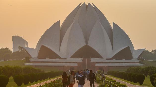 Visitors at Lotus Temple in Kalkaji on November 18. According to IMD scientists, the minimum temperature does not usually drop below 10°C in November. In November 2019, the lowest temperature was 11.4°C and in the same month the previous year, this was 10.5°C. (Amal KS / HT Photo) Visitors at Lotus Temple in Kalkaji on November 18. According to IMD scientists, the minimum temperature does not usually drop below 10°C in November. In November 2019, the lowest temperature was 11.4°C and in the same month the previous year, this was 10.5°C. (Amal KS / HT Photo)