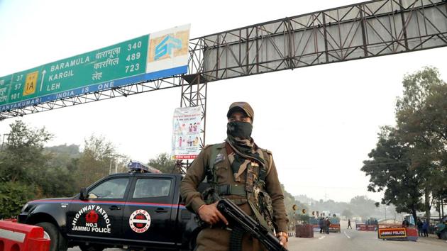 Jammu and Kashmir: A security personnel stands guard at the encounter site where 4 terrorists were killed by security forces at Nagrota on Thursday.(ANI)