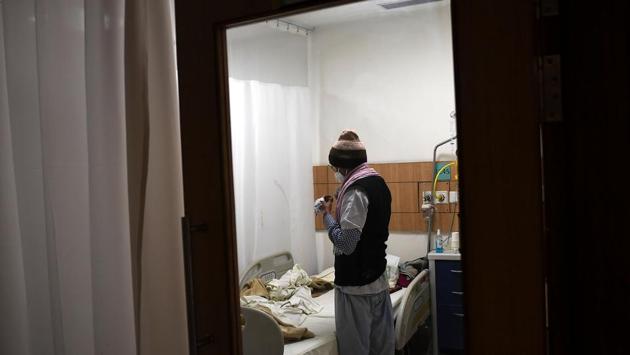 A patient is seen inside a Covid-19 coronavirus ward at Max Hospital in New Delhi on November 21. India is currently dealing with 440,962 active cases, and 8,521,617 recoveries have been recorded in the country overall. (Money Sharma / AFP)