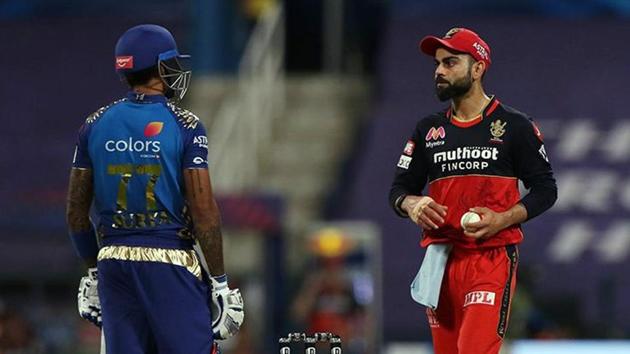 Virat Kohli of the Royal Challengers Bangalore and Surya Kumar Yadav of Mumbai Indians during match 48 of IPL 2020 at Sheikh Zayed Stadium, in Abu Dhabi.(ANI) Virat Kohli of the Royal Challengers Bangalore and Surya Kumar Yadav of Mumbai Indians during match 48 of IPL 2020 at Sheikh Zayed Stadium, in Abu Dhabi.(ANI)