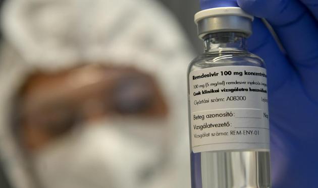 FILE - In this Thursday Oct. 15, 2020 file photo, A bottle containing the drug Remdesivir is held by a health worker at the Institute of Infectology of Kenezy Gyula Teaching Hospital of the University of Debrecen in Debrecen, Hungary. Health officials around the world are clashing over the use of certain drugs for COVID-19, leading to different treatment options for patients depending on where they live. The World Health Organization guidelines panel advised against using the antiviral remdesivir for hospitalized patients, saying there’s no evidence it improves survival or avoids the need for breathing machines. (Representational)(AP) FILE - In this Thursday Oct. 15, 2020 file photo, A bottle containing the drug Remdesivir is held by a health worker at the Institute of Infectology of Kenezy Gyula Teaching Hospital of the University of Debrecen in Debrecen, Hungary. Health officials around the world are clashing over the use of certain drugs for COVID-19, leading to different treatment options for patients depending on where they live. The World Health Organization guidelines panel advised against using the antiviral remdesivir for hospitalized patients, saying there’s no evidence it improves survival or avoids the need for breathing machines. (Representational)(AP)