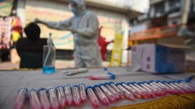 Samples collected from passengers for Covid-19 test are seen during a testing drive for coronavirus infection, near Kashmere Gate Inter State Bus Terminal (ISBT) in New Delhi on November 22. Delhi government shared that even though nearly 45,500 tests were conducted on November 21 against an average of over 62,000 tests over the last three days, nearly 48% of them were done through RT-PCR method. (Sanchit Khanna / HT Photo) Samples collected from passengers for Covid-19 test are seen during a testing drive for coronavirus infection, near Kashmere Gate Inter State Bus Terminal (ISBT) in New Delhi on November 22. Delhi government shared that even though nearly 45,500 tests were conducted on November 21 against an average of over 62,000 tests over the last three days, nearly 48% of them were done through RT-PCR method. (Sanchit Khanna / HT Photo)