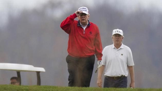 President Donald Trump plays golf at Trump National Golf Club in Sterling on November 21. (AP) President Donald Trump plays golf at Trump National Golf Club in Sterling on November 21. (AP)