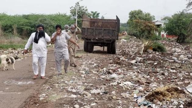 Zirakpur, Punjab, india April 09, 2018 : Residents showing the garbage dump in Dayalpura village Ward no 23 in Zirakpur city of district SAS Nagar on April 09, 2018. (Sushil Prajapati/HT Photo) Zirakpur, Punjab, india April 09, 2018 : Residents showing the garbage dump in Dayalpura village Ward no 23 in Zirakpur city of district SAS Nagar on April 09, 2018. (Sushil Prajapati/HT Photo)