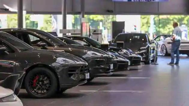 A customer looks at automobiles. (Bloomberg) A customer looks at automobiles. (Bloomberg)