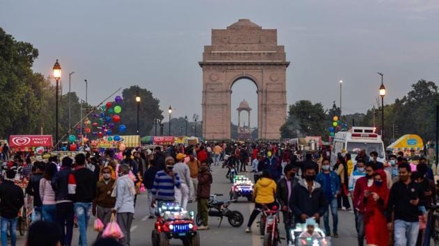 People visit the India Gate at Rajpath, amid the ongoing coronavirus pandemic, in New Delhi, Sunday, Nov. 22, 2020. (PTI photo) People visit the India Gate at Rajpath, amid the ongoing coronavirus pandemic, in New Delhi, Sunday, Nov. 22, 2020. (PTI photo)