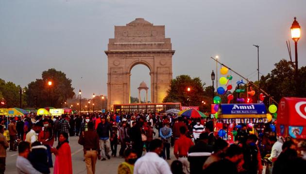 People visit the India Gate at Rajpath, amid the ongoing coronavirus pandemic, in New Delhi on Sunday. (PTI) People visit the India Gate at Rajpath, amid the ongoing coronavirus pandemic, in New Delhi on Sunday. (PTI)