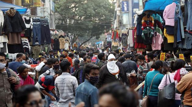 A massive crowd of people shopping while violating social distancing norms after the Covid-19 outbreak, in Sarojini Nagar market in New Delhi on Sunday.(ANI Photo) A massive crowd of people shopping while violating social distancing norms after the Covid-19 outbreak, in Sarojini Nagar market in New Delhi on Sunday.(ANI Photo)