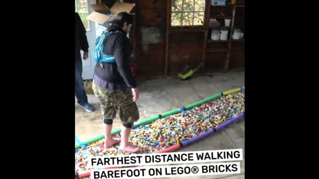 The video shows Kevin “L.A. Beast” Strahle walking on LEGO bricks.(Facebook/@Guinness World Records)