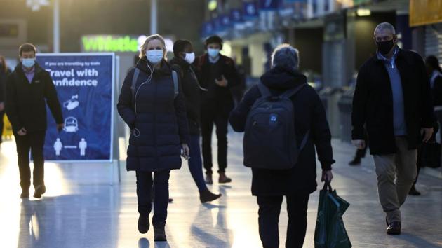 People walk through Waterloo station, amid the coronavirus disease (Covid-19) outbreak, in London, Britain.(Reuters)