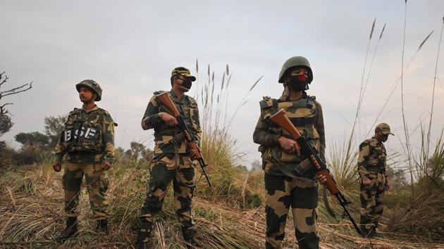 Jammu: Security personel stand gurad beside an underground tunnel near the international border in Samba sector, suspected to have been used by terrorists killed in a recent encounter in Nagrota, in Jammu district(PTI)