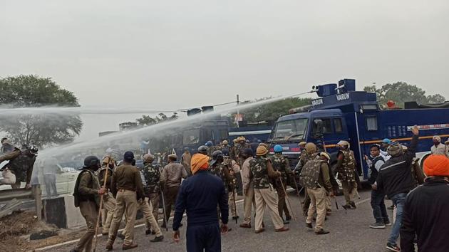 Water cannons being used to prevent farmers from carrying out the Delhi Chalo march to protest the Centre’s farm laws, in Ambala on Wednesday.(HT Photo) Water cannons being used to prevent farmers from carrying out the Delhi Chalo march to protest the Centre’s farm laws, in Ambala on Wednesday.(HT Photo)
