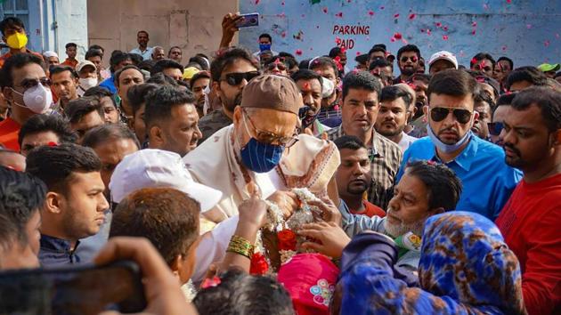 AIMIM President and MP Asaduddin Owaisi participates in a door-to-door GHMC election campaign for Jambagh candidate Jadala Ravindra at Jambagh division in Hyderabad.(PTI) AIMIM President and MP Asaduddin Owaisi participates in a door-to-door GHMC election campaign for Jambagh candidate Jadala Ravindra at Jambagh division in Hyderabad.(PTI)