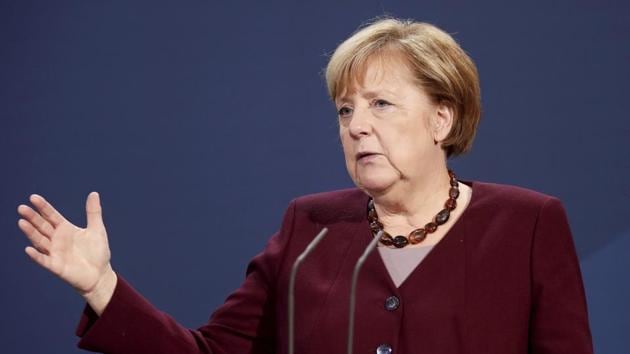 German Chancellor Angela Merkel holds a joint news conference with Finance Minister Olaf Scholz after a virtual G20 summit meeting, at the Chancellery in Berlin, Germany, Sunday Nov. 22, 2020. (Hannibal Hanschke/Pool via AP)(AP) German Chancellor Angela Merkel holds a joint news conference with Finance Minister Olaf Scholz after a virtual G20 summit meeting, at the Chancellery in Berlin, Germany, Sunday Nov. 22, 2020. (Hannibal Hanschke/Pool via AP)(AP)