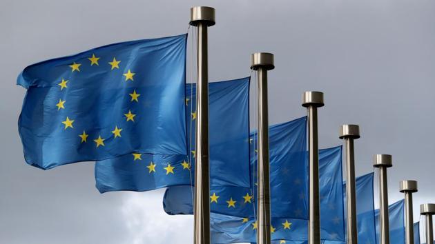 European Union flags flutter in front of the European Commission headquarters in Brussels, Belgium.(Reuters)